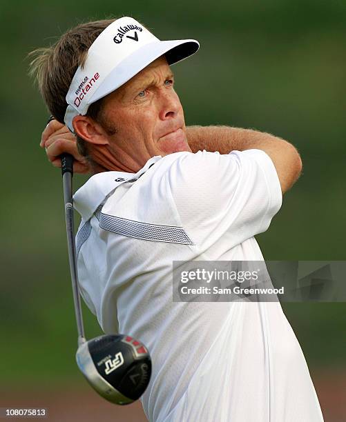 Stuart Appleby of Australia plays a shot on the 13th hole during the third round of the Sony Open at Waialae Country Club on January 16, 2011 in...