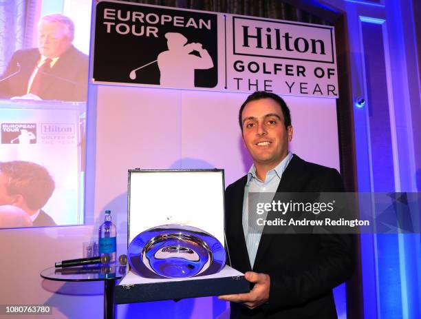 Francesco Molinari of Italy poses with the trophy as he is announced as the 2018 Hilton European Tour Golfer of the Year on December 10, 2018 at the...