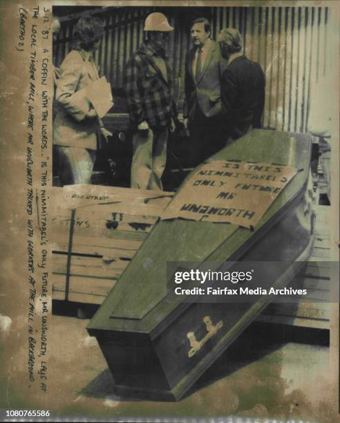 Coffin with the words - "is the Nimmitabel's only future, Mr. Unsworth, Lays at the local timber mill, where Mr. Unsworth tacked with workers at mill...