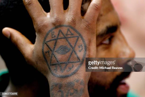 Detail of Kyrie Irving of the Boston Celtics tattoo against the Miami Heat during the second half at American Airlines Arena on January 10, 2019 in...
