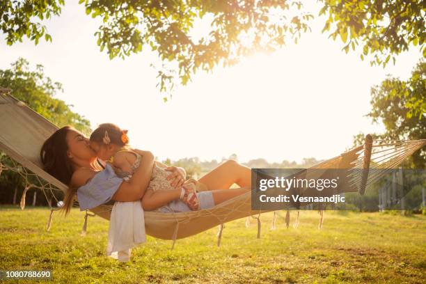 our time in hammock - family time stock pictures, royalty-free photos & images