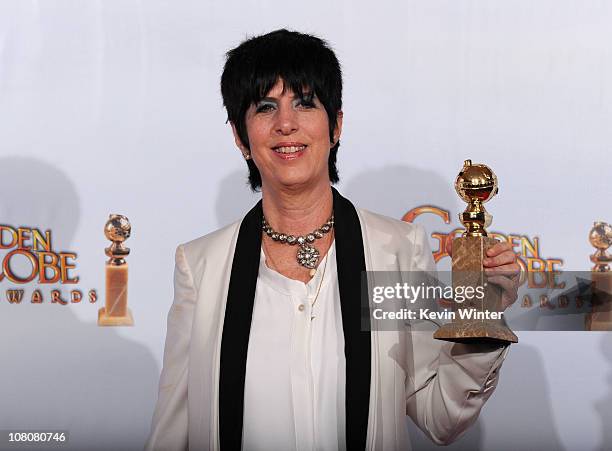 Songwriter Diane Warren poses with her award for Best Original Song for "You Haven't Seen the Last of Me" from "Burlesque" in the press room at the...