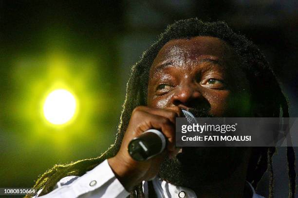 South African reggae singer Lucky Dube performs at the global call concert against poverty in Johannesburg, South Africa, 02 July 2005. Lucky Philip...