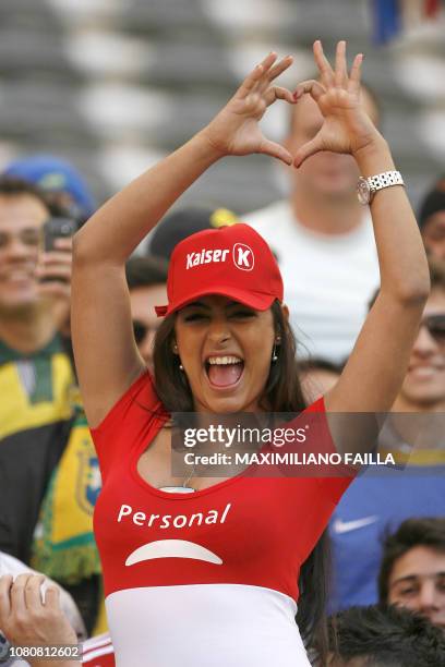 Paraguayan supporter Larissa Riquelme poses before a 2011 Copa America quarter-final football match against Brazil held at the Ciudad de La Plata...