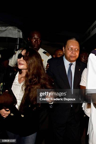 Jean-Claude Duvalier , the former Haitian leader "Baby Doc", arrives at the airport with companion Veronique Roy on January 16, 2011 in...