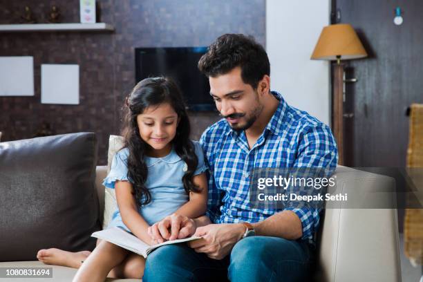 indian family - stock images - daughter dad stock pictures, royalty-free photos & images