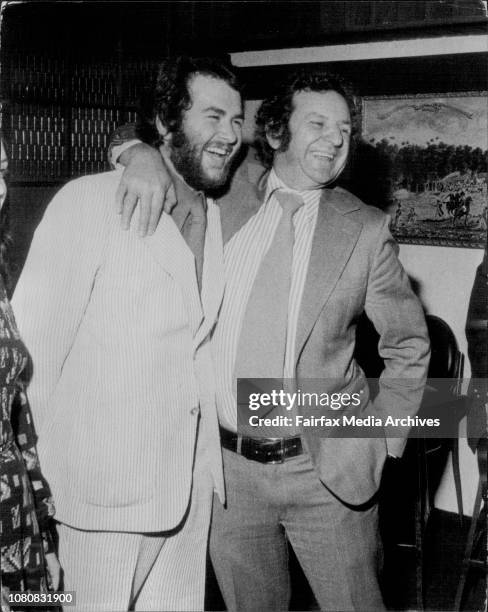 Jack Mundey talks to the Young Libs at a dinner at a Crows Nest Restaurant tonight.Mr Mundey puts his arm ground the neck of the President of the...