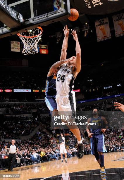 Richard Jefferson of the San Antonio Spurs shoots against J.R. Smith of the Denver Nuggets during the game on January 16, 2011 at the AT&T Center in...