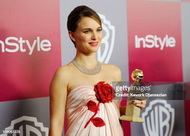 Actress Natalie Portman, winner of the Best Performance By An Actress in a Motion Picture award for "Black Swan"arrives at the 2011 InStyle And...