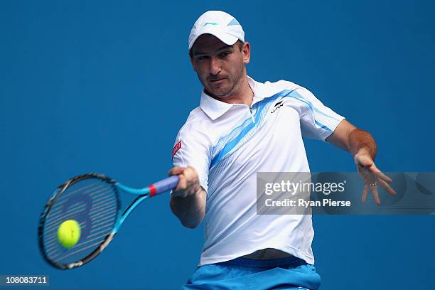 Jan Hajek of the Czech Republic plays a forehand in his first round match against Andy Roddick of the United States of America during day one of the...