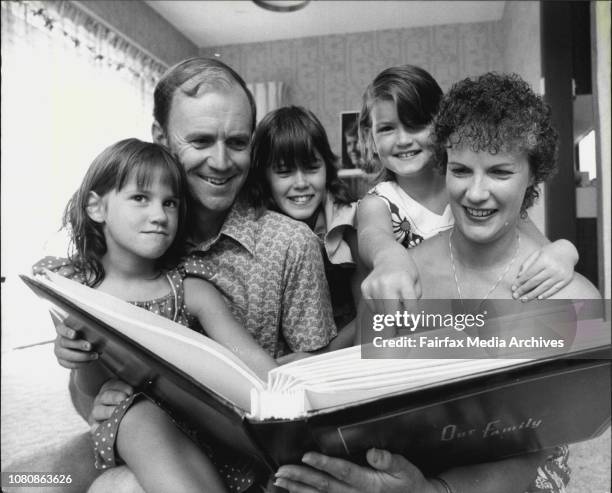 The Entrance and Tuggerah Lake area to go with story on the area.Members of the Tipping family look through their holiday album at their Mt Colah...