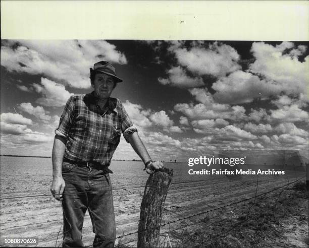 Drought pics taken in Moree area.Max Thompson, wheat farmer, of Moree, on his failed wheat crop paddocks waiting for rain. October 27, 1980. .