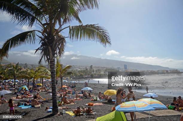 Crowded beach in Puerto de la Cruz, Tenerife.