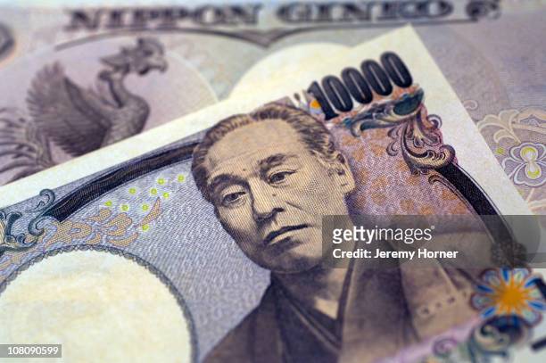 japanese yen currency - the y stock pictures, royalty-free photos & images