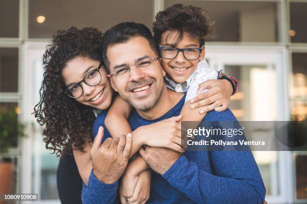 portrait of happy family - spectacles stock pictures, royalty-free photos & images