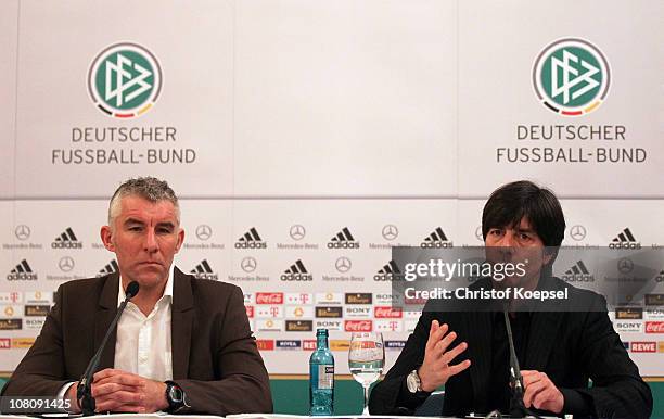 Head coach Mirko Slomka of Hannover and national coach Joachim Loew of Germany attend the press conference at Kempinski-Hotel Gravenbruch on January...