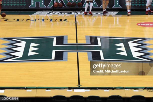 The Hawaii logo on the floor during a Rainbow Wahine Showdown women's college basketball game between the Stanford Cardinal and the American...