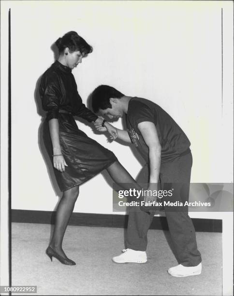 Your attacker grabs your arm from the front.Swing back one of your legs and kick him in the groin. April 4, 1984. .