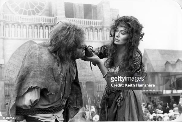 Welsh actor Anthony Hopkins as Quasimodo and Lesley-Anne Down as Esmeralda in the film 'The Hunchback of Notre Dame', aka 'Hunchback', 1982. Here she...