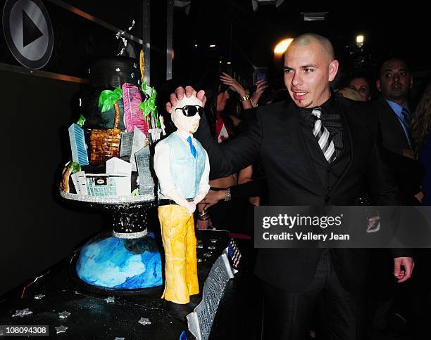 Pitbull arrives for his 3oth birthday celebration at Club Play on January 15, 2011 in Miami Beach, Florida.