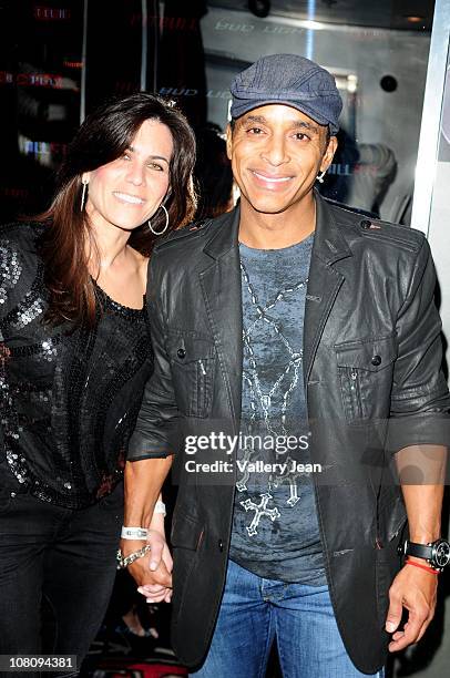 Jo Pat and Jon Secada arrive at Rapper Pitbull 3oth birthday celebration at Club Play on January 15, 2011 in Miami Beach, Florida.