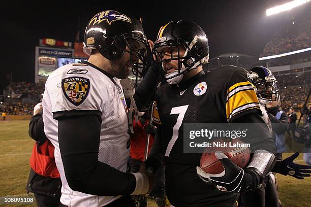 Quarterback Ben Roethlisberger of the Pittsburgh Steelers speaks with quarterback Joe Flacco of the Baltimore Ravens following the AFC Divisional...