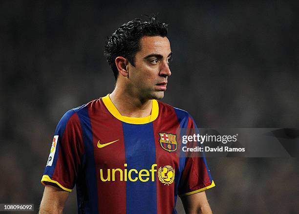 Xavi Hernandez of FC Barcelona looks on during the La Liga match between FC Barcelona and Malaga at Nou Camp on January 16, 2011 in Barcelona, Spain....