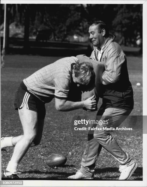 Great Britain RL fullback Mick Burke during tacking practice with his coach Frank Myler. June 05, 1984. .