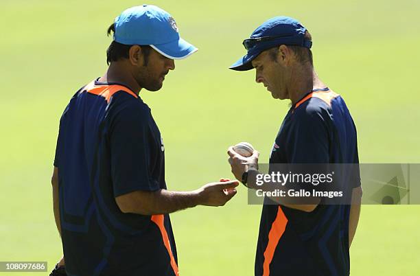 Mahendra Singh Dhoni and Gary Kirsten of India attend a national cricket team practice session at Sahara Park Newlands on January 17, 2011 in Cape...