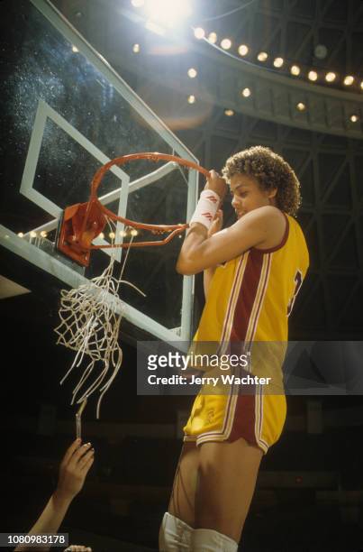 Finals: USC Cheryl Miller victorious cutting net after winning game vs Lousiana Tech at Old Dominion University Fieldhouse. Norfolk, VA 4/3/1983...