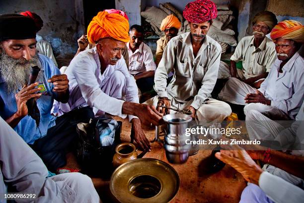Traditional meeting of a group of men to smoke ganja on June 13, 2012 in Dhamli near Pali, Rajasthan