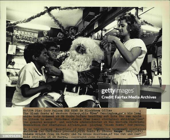 The Black Santa of Western Sydney, alia "Doc" Cunningham, gets his long white hair trimmed at St. Marrys before headding out into the sun again to listen to more Christmas wishes from local aboriginal children. "Doc" the general manager and welfare admini The Black Santa of Western Sydney, alia "Doc" Cunningham, gets his long white hair trimmed at St. Marrys before headding out into the sun again to listen to more Christmas wishes from local aboriginal children. "Doc" the general manager and welfare admini
