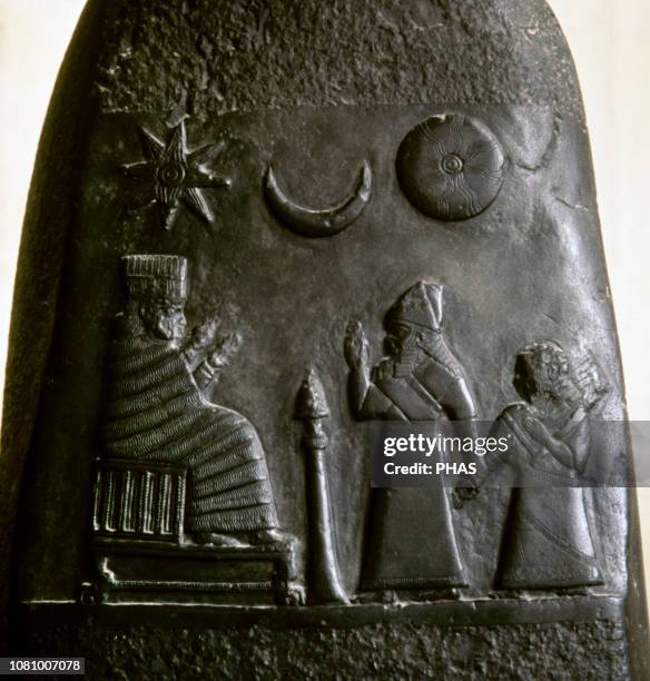 Kudurru of King Melishipak I . The king introduces his daughter to the goddess Nannaya. The crescent moon represents the god Sin, the sun the Shamash...