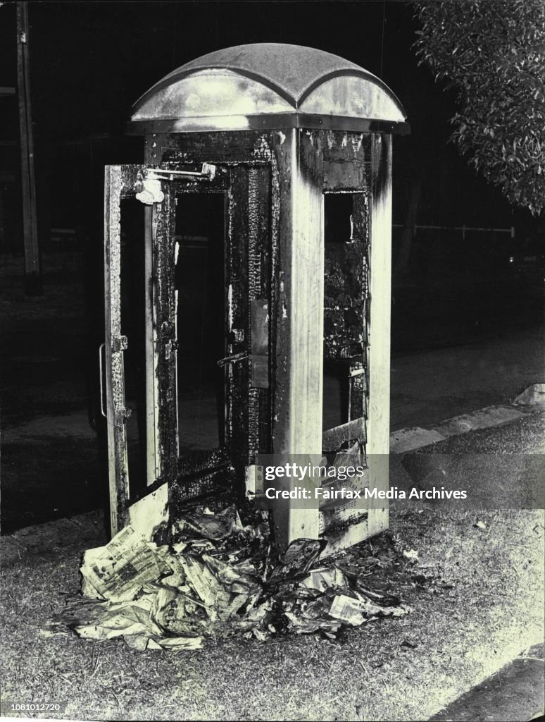 Vandals are believed to have been responsible for destroying this telephone box by fire. The telephone box was in Dickson St and Shortland Ave Strathfield. Fireman from Burwood the fire.