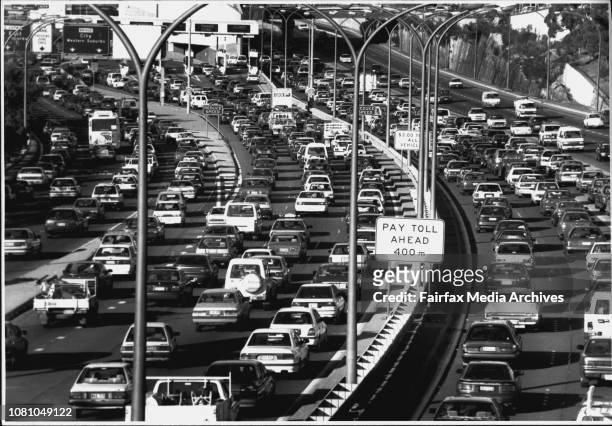 Traffic Jam on the Northern Approaches to the Harbour Bridge.Going nowhere ... Peak-hour Harbour Tunnel traffic banks back 6.5 kilometres.For 2Â½...