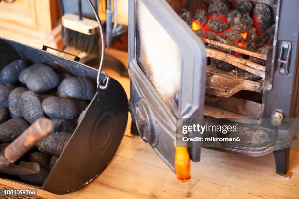 stove in a traditional country cottage, ireland - fornuis stockfoto's en -beelden