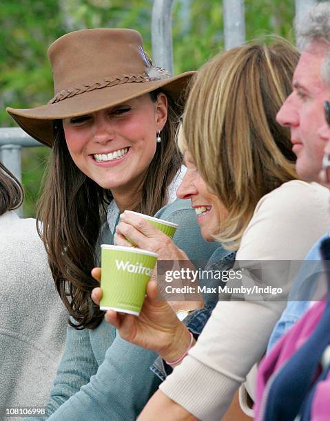 Kate Middleton talks with her mother Carole Middleton as they attend the Festival of British Eventing at Gatcombe Park on August 6, 2005 in Stroud,...