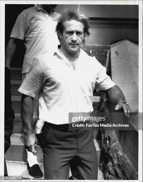 Warren Richards, whom criminal Lee Henderson claims was one of Sallie-Anne Huckstepp's killers, near Redfern Local Court yesterday. March 26, 1990. .