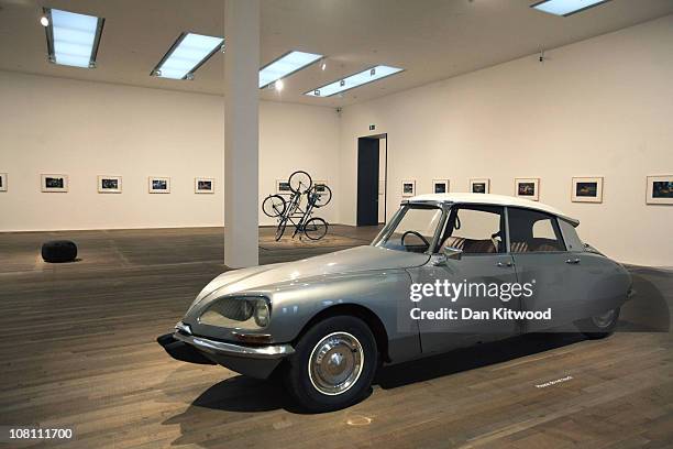 General view of works by Mexican Artist Gabriel Orozco including a piece entitled 'La DS', a modified classic Citroen DS, at Tate Modern on January...