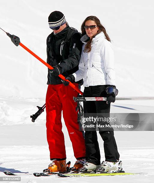 Prince William and girlfriend Kate Middleton use a T-bar drag lift whilst on a skiing holiday on March 19, 2008 in Klosters, Switzerland.