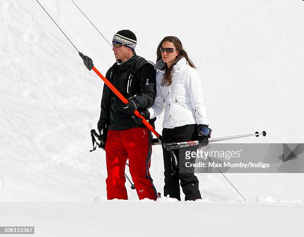 Prince William and girlfriend Kate Middleton use a T-bar drag lift whilst on a skiing holiday on March 19, 2008 in Klosters, Switzerland.