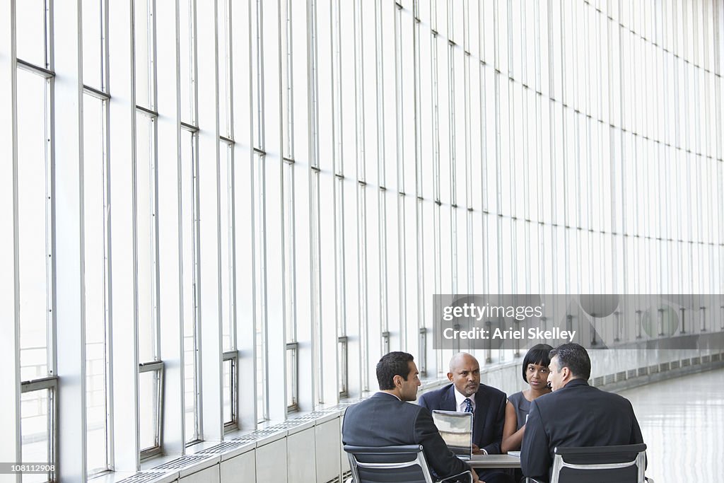 Business people talking in meeting