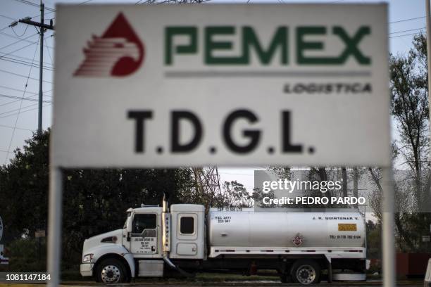 Tanker truck from Mexico's oil company, PEMEX, enters a refinery to load up on fuel in Tula, Hidalgo state, Mexico, on January 11, 2018. - President...