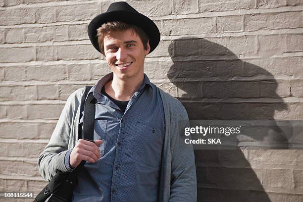 Man Fedora Shadow Photos and Premium High Res Pictures - Getty Images