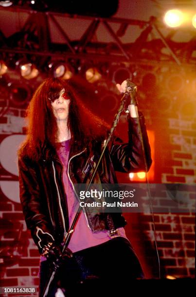 Joey Ramone of the Ramones performs on stage at the Marcus Ampitheater in Milwaukee, Wisconsin, July 1, 1990.