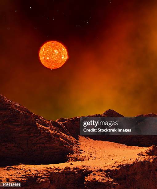 a rugged planet landscape dimly lit by a distant red star. - mars landscape stock illustrations