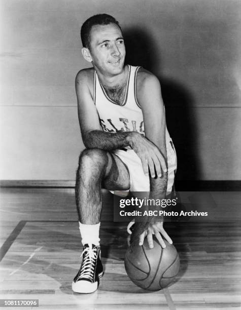 Boston Celtics player Bob Cousy in uniform.