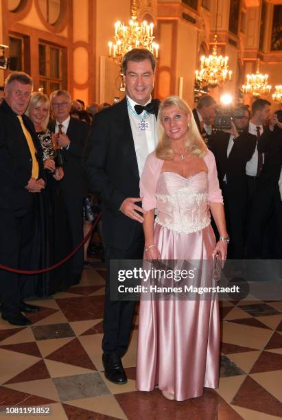 Markus Soeder, Governor of Bavaria and lead candidate of the Christian Social Union , and his wife, Karin Baumueller-Soeder during the new year...