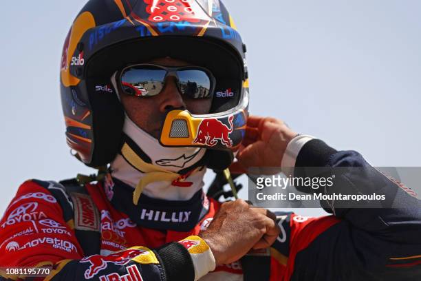 Nasser Al-Attiyah of Qatar with his Toyota Gazoo Racing Sa no. 301 TOYOTA HILUX car and co-driver Matthieu Baumel of France gets ready to start on...