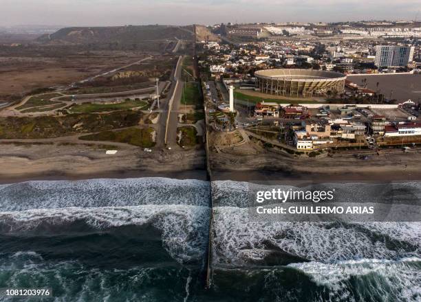 Aerial view of the US-Mexico border fence seen from Playas de Tijuana, Baja California state, on January 11, 2019.